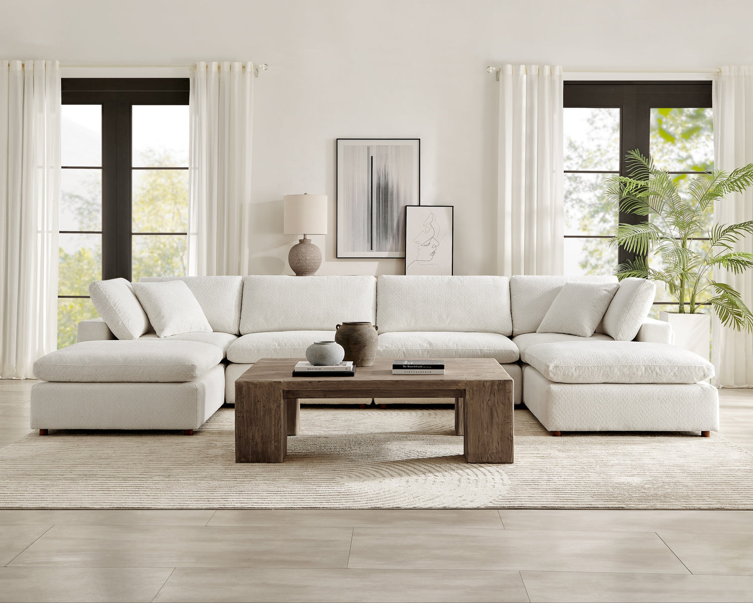 Serene Collection modern white modular sectional sofa in a bright minimalist living room with wood coffee table